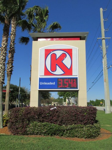 Circle K pylon sign with illuminated logo and digital fuel price display