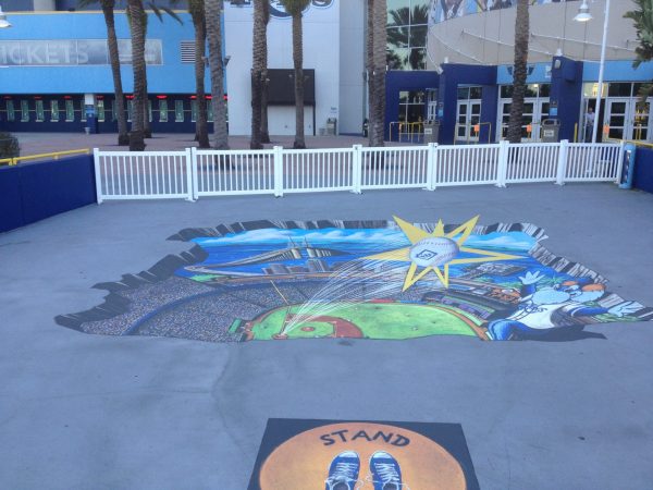 Custom floor graphic designed by Thomas Sign for Tropicana Field, showcasing vibrant Rays branding.