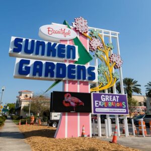 Sunken Gardens custom signage crafted and installed by Thomas Sign & Awning, showcasing vibrant colors and intricate design elements.