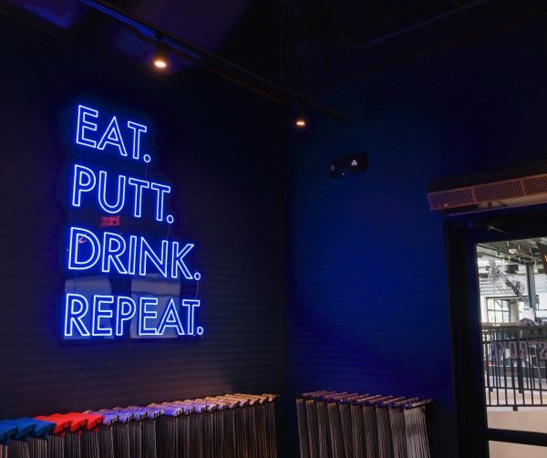 popstroke restaurant interior sign with blue LED neon lettering