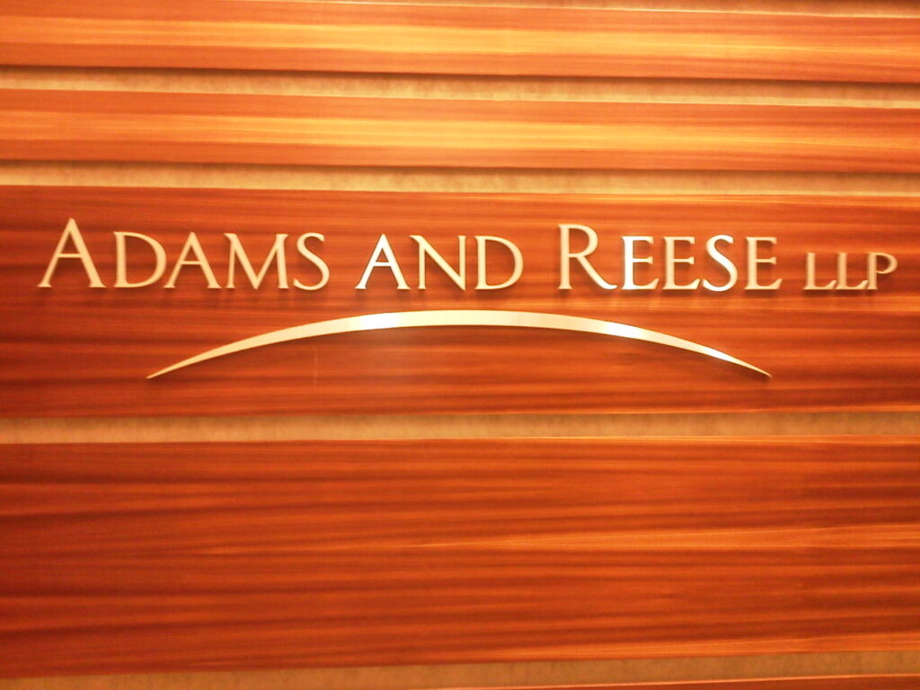 Non-illuminated channel letter sign for Adams and Reese LLP fabricated and installed by Thomas Sign & Awning.