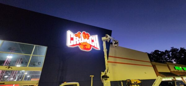 Crunch Fitness Acworth franchise wall sign installed by Thomas Sign – corporate-approved vendor signage