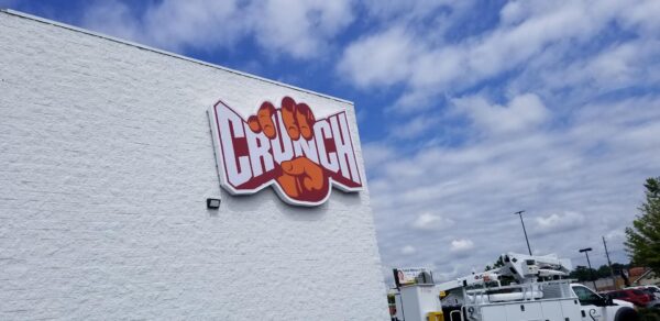 Crunch Fitness illuminated wall sign installed in Hiram, GA