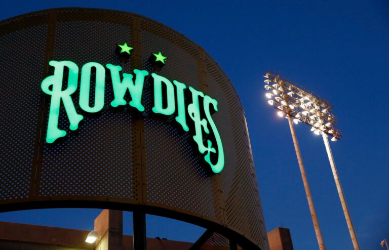Channel letter sign for Rowdies illuminated at night, fabricated and installed by Thomas Sign & Awning in St. Petersburg, Florida.