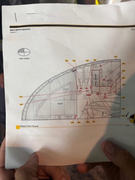 Wayfinding signage design plan showing layout and directional system for building navigation