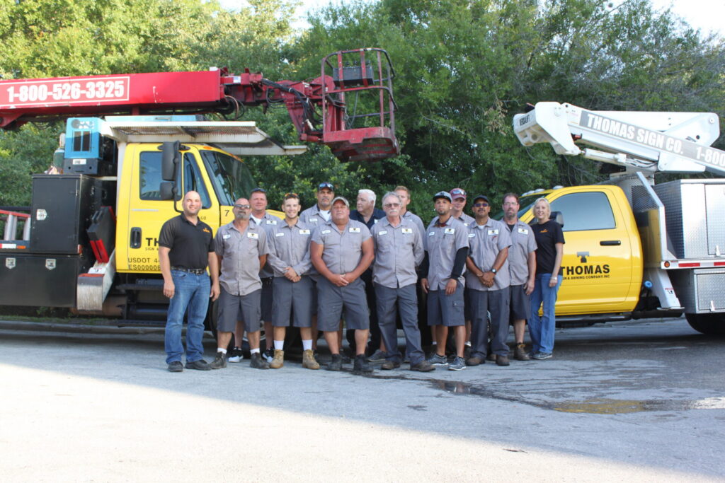 Thomas Sign commercial sign installation team with equipment