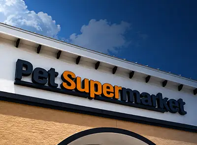 Commercial sign types including channel letters, monument signs, blade signs, and storefront signage