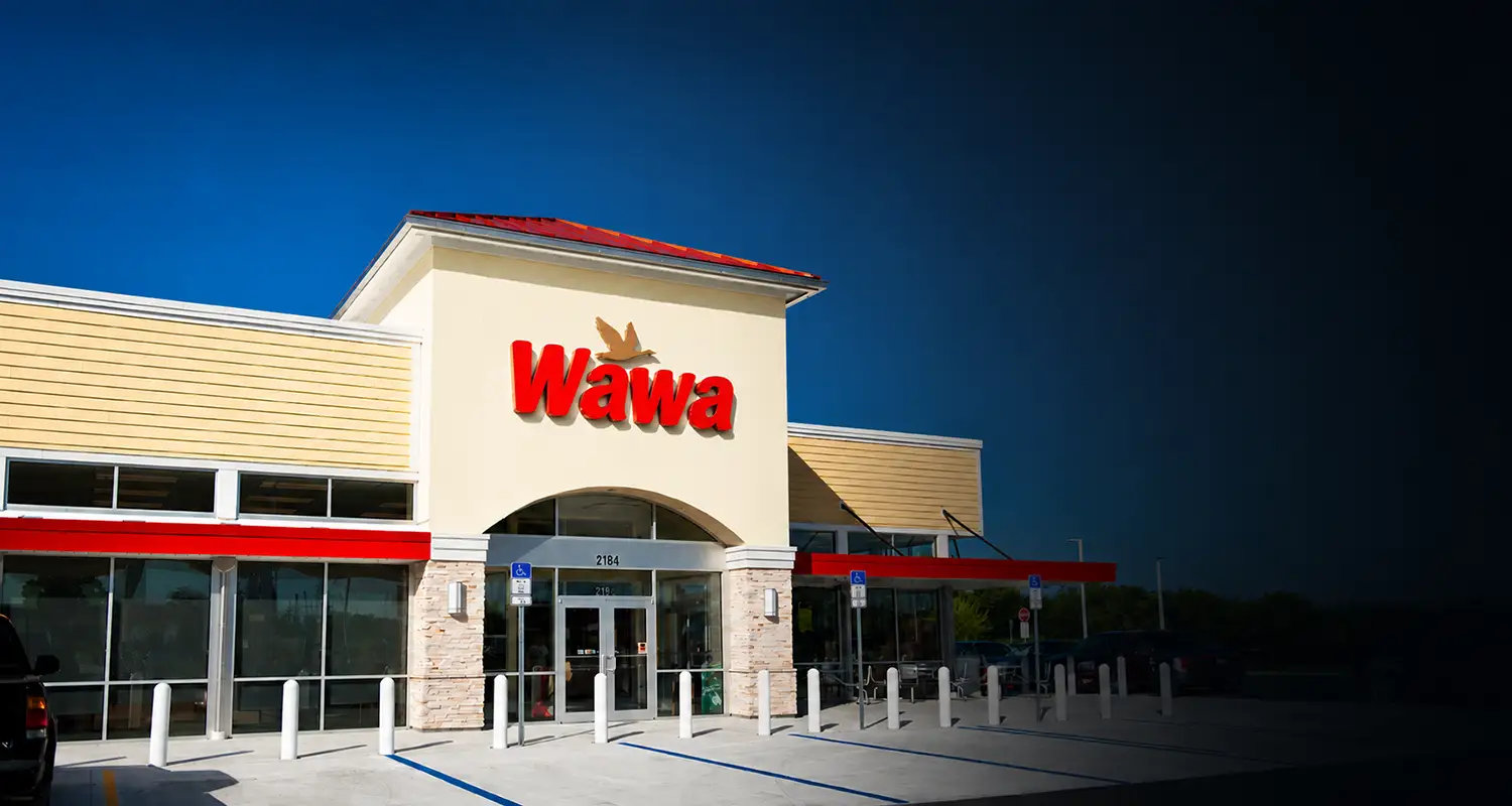 Wawa storefront with branded exterior signage as part of a multi-location signage rollout project by Thomas Sign & Awning