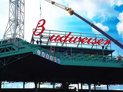 National sign manufacturing and installation for multi-location business signage programs