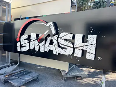Custom wall signage for storefront branding and business identification