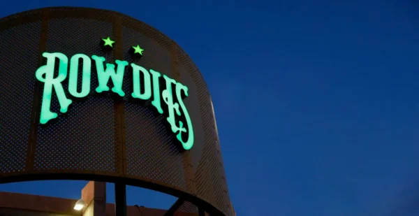 Channel letter signs installed on a commercial storefront for building identification
