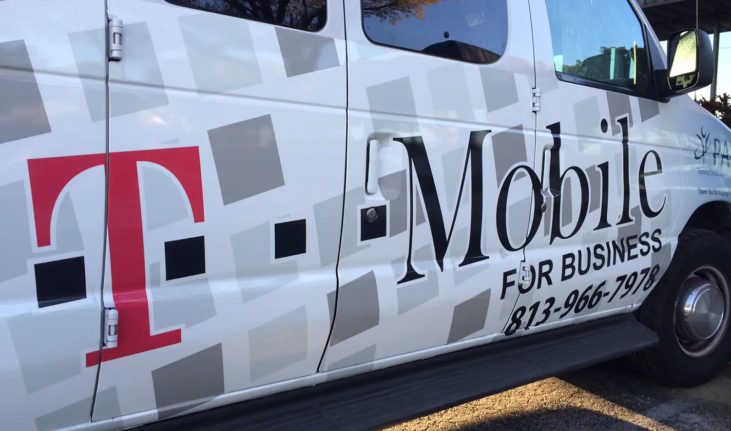 Vehicle and ATM wraps installed by Thomas Sign for commercial branding.