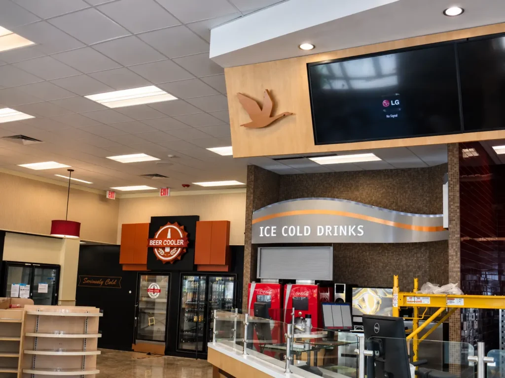 Custom interior signage at a Wawa store
