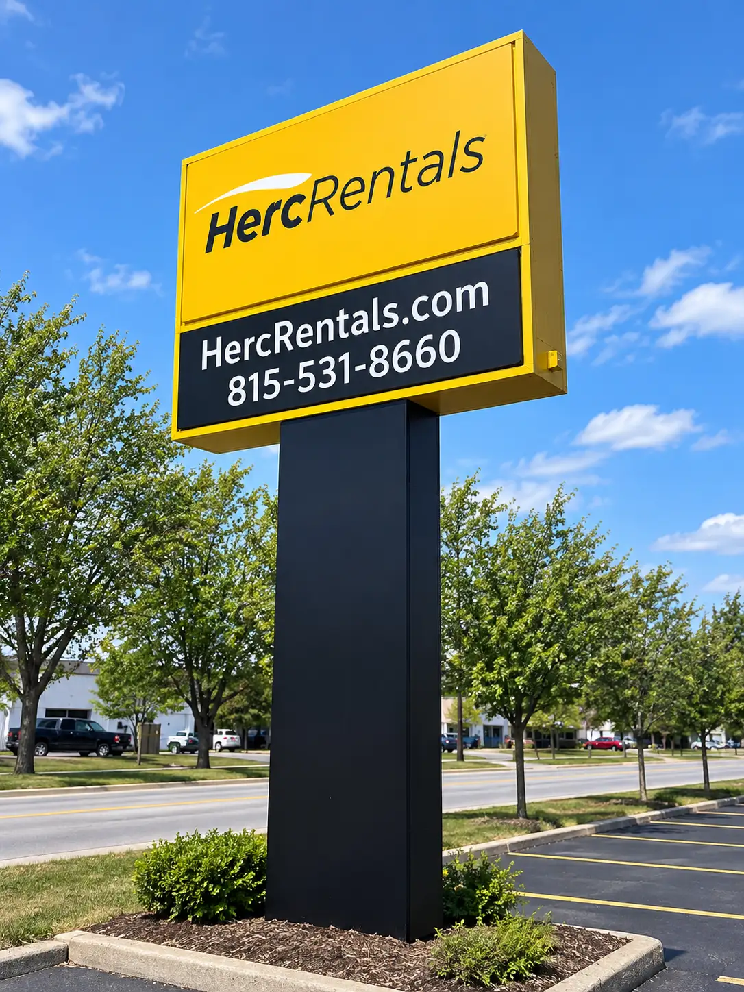 Herc Rentals freestanding pylon sign with branded sign cabinet