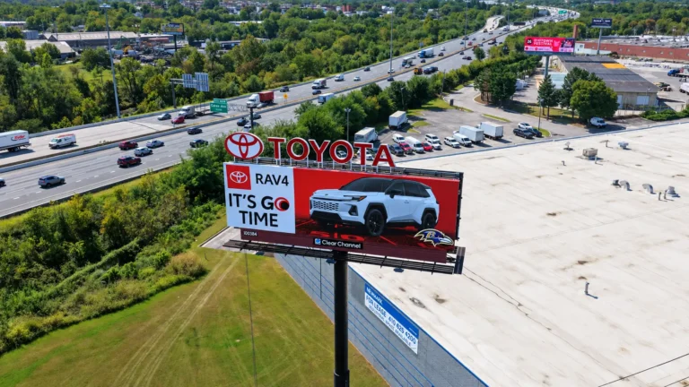Toyota dealership signage installed along a major highway