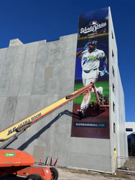 74-foot Tampa Bay Rays World Series banner installed on a parking garage in St. Petersburg, Florida.