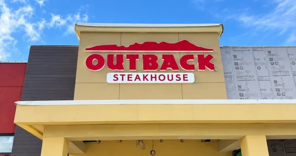 Red Outback Steakhouse channel letters above the restaurant entrance in Davenport, Florida.