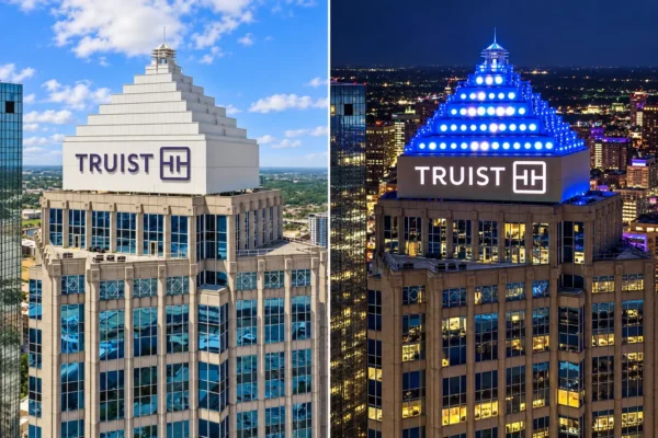 Side-by-side daytime and nighttime views of Truist channel letters and logo atop a Tampa high-rise.