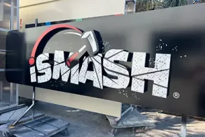 Custom wall signage for storefront branding and business identification