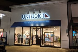 Halo-lit channel letter sign for UNTUCKit retail store fabricated and installed by Thomas Sign & Awning in Corte Madera, California.