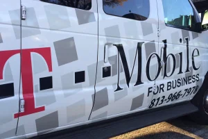 Vehicle and ATM wraps installed by Thomas Sign for commercial branding.